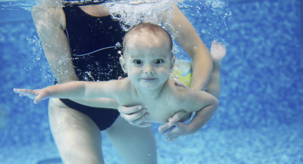 Take swimming lessons one step at a time.